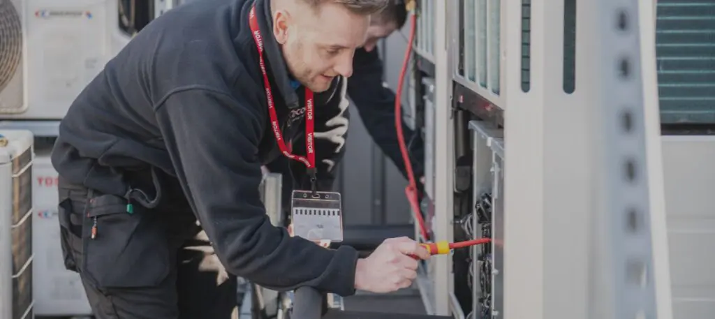 Ecotech engineer servicing a school boiler and ventilation system in South Yorkshire
