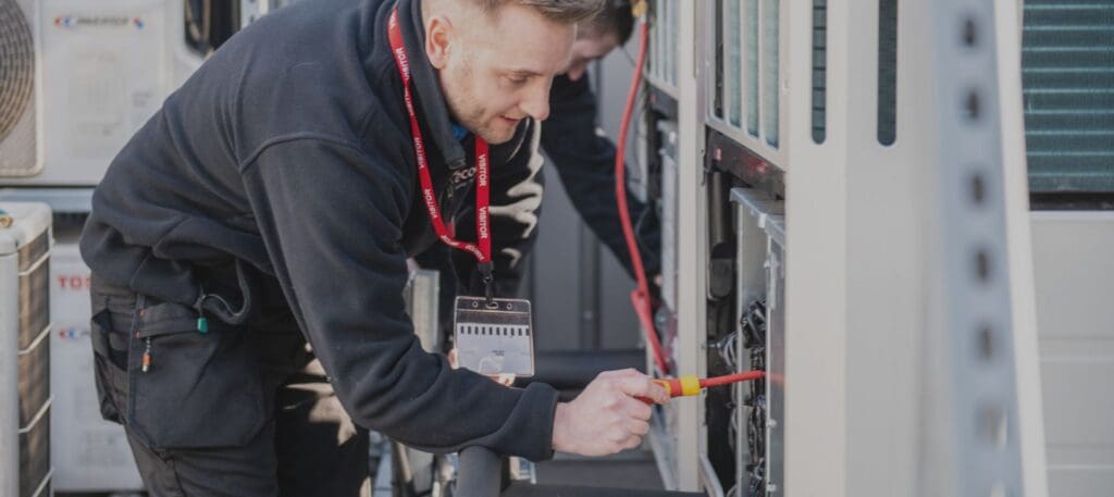 Ecotech engineer servicing a school boiler and ventilation system in South Yorkshire